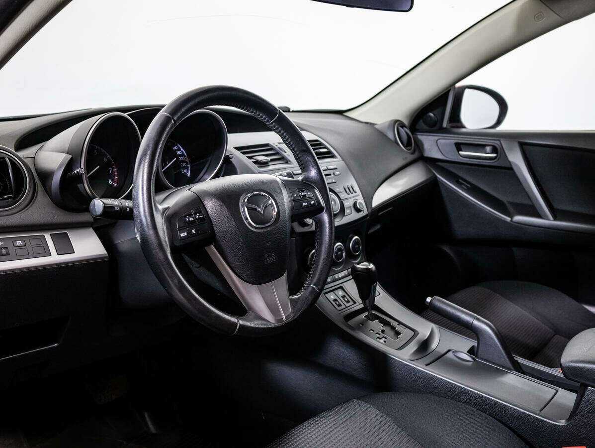Mazda 3 с пробегом — 2012 год. Фото: #10