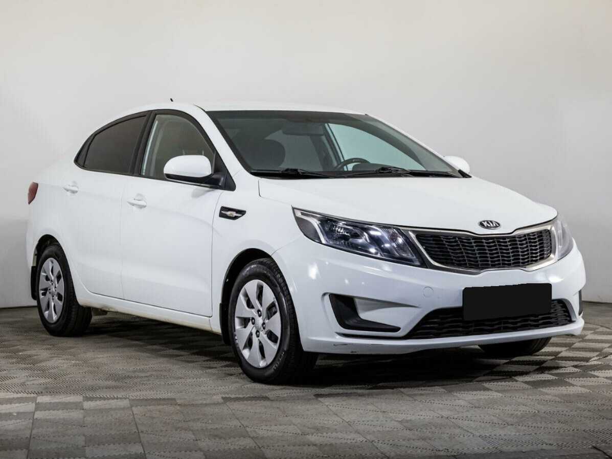 Kia Rio с пробегом — 2014 год. Фото: #2