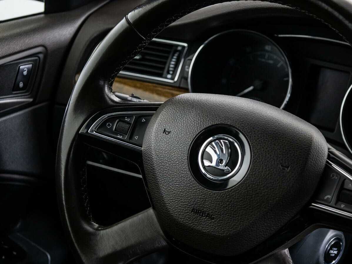 Skoda Superb с пробегом — 2014 год. Фото: #13