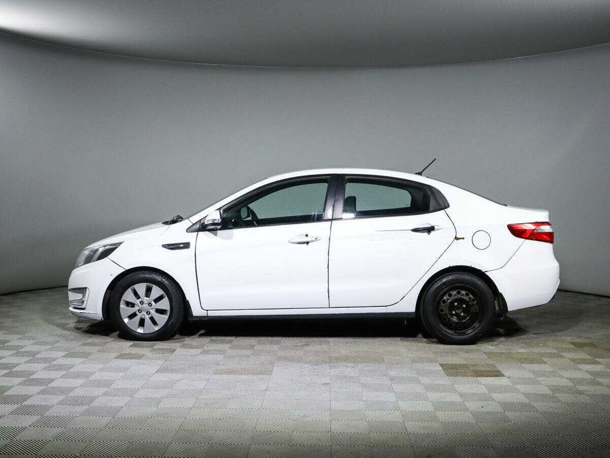 Kia Rio с пробегом — 2014 год. Фото: #7