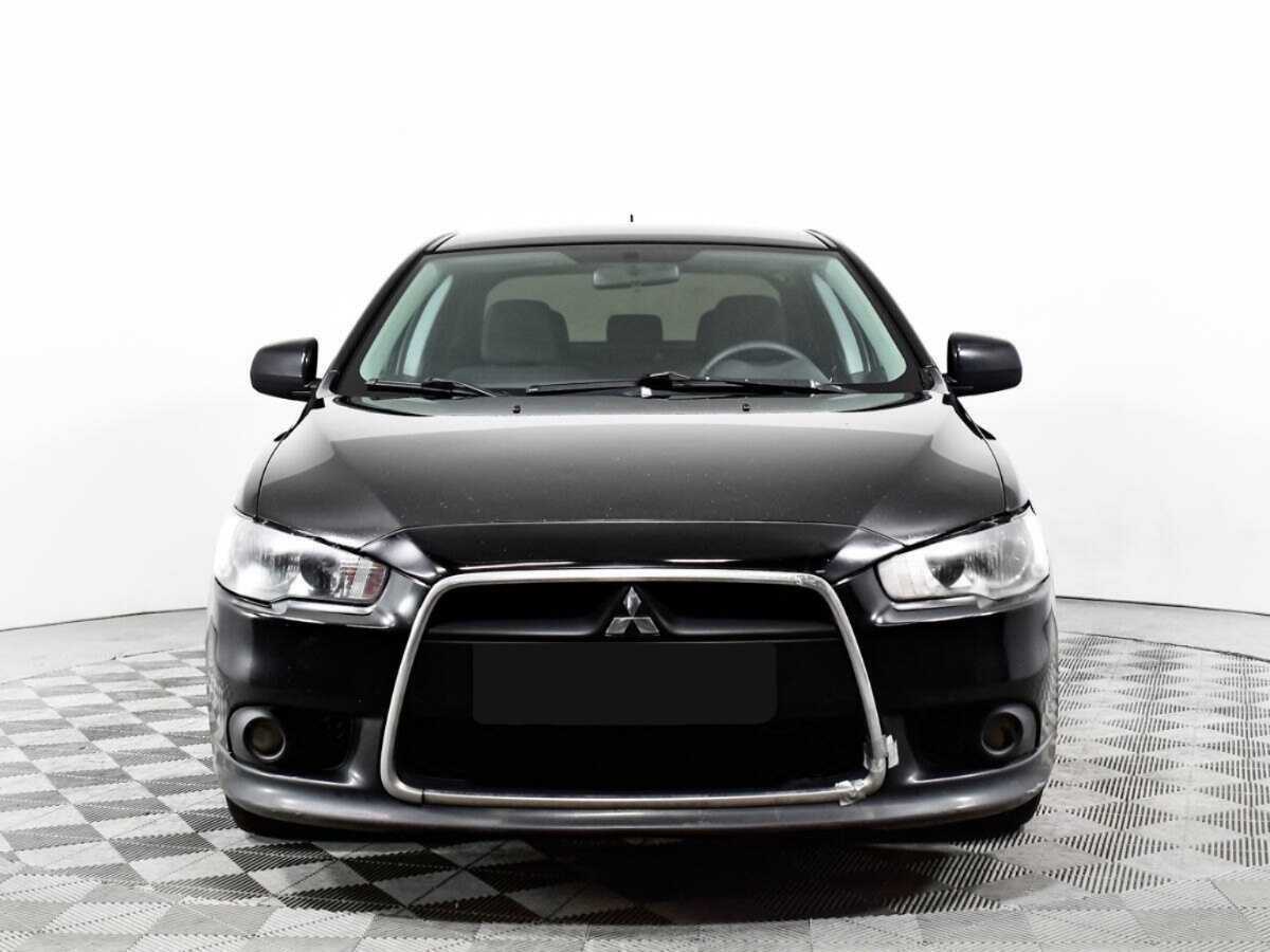 Mitsubishi Lancer с пробегом — 2012 год. Фото: #1