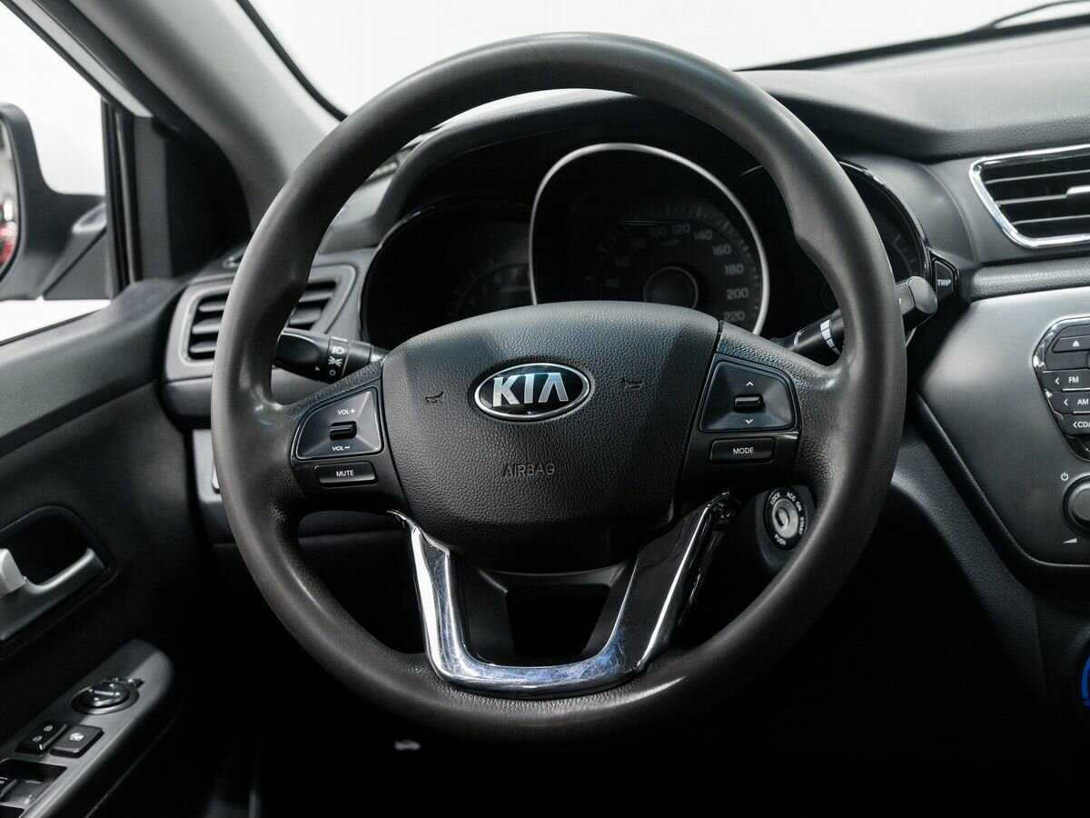 Kia Rio с пробегом — 2013 год. Фото: #9
