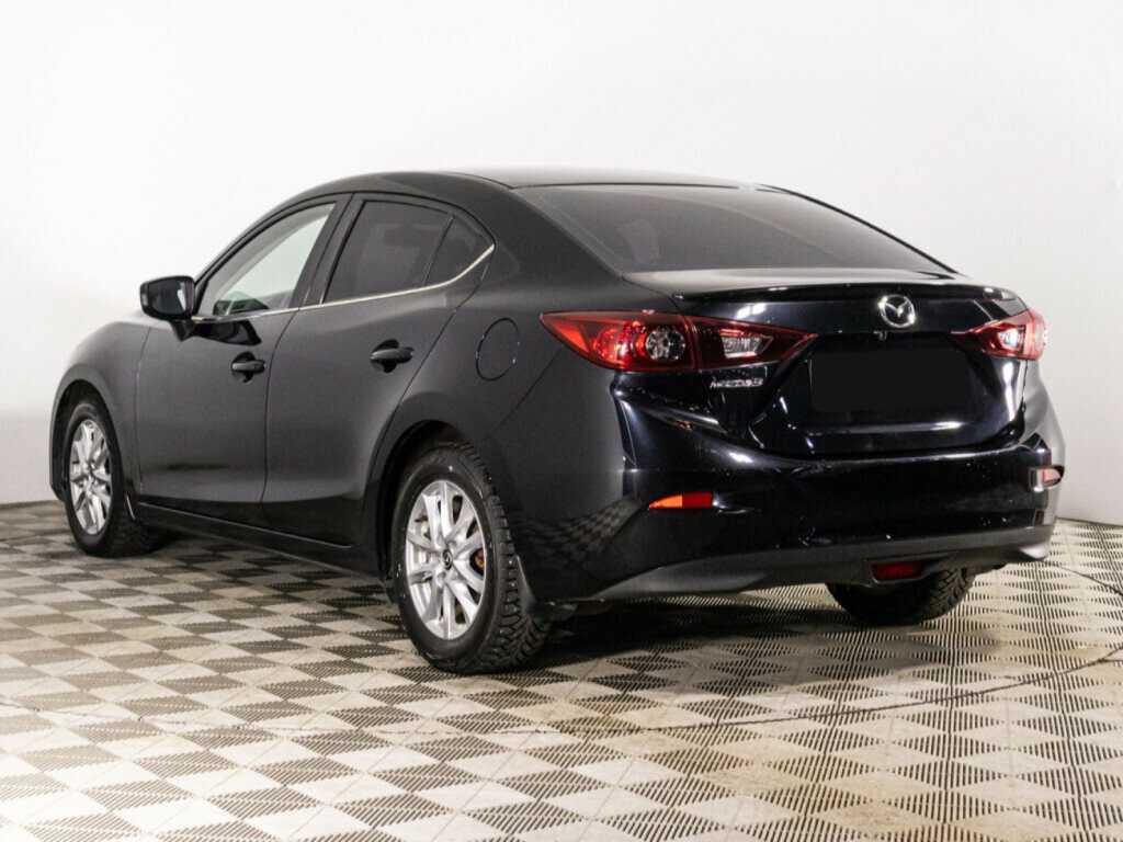 Mazda 3 с пробегом — 2013 год. Фото: #6