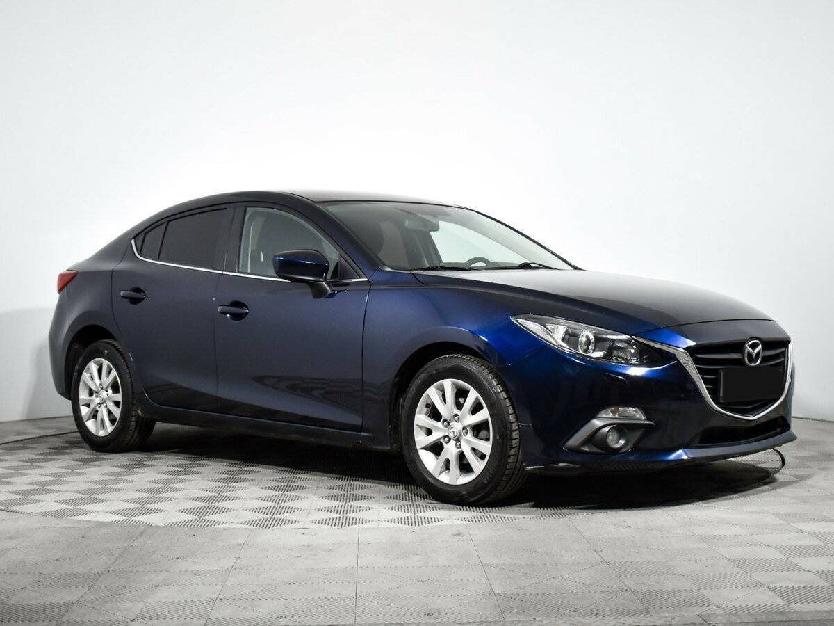 Mazda 3 с пробегом — 2014 год. Фото: #2