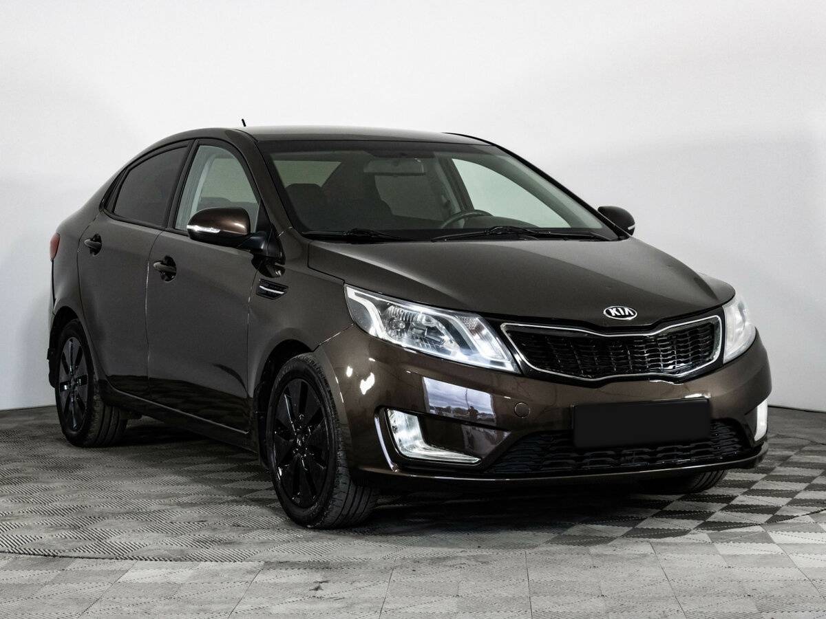 Kia Rio с пробегом — 2014 год. Фото: #2
