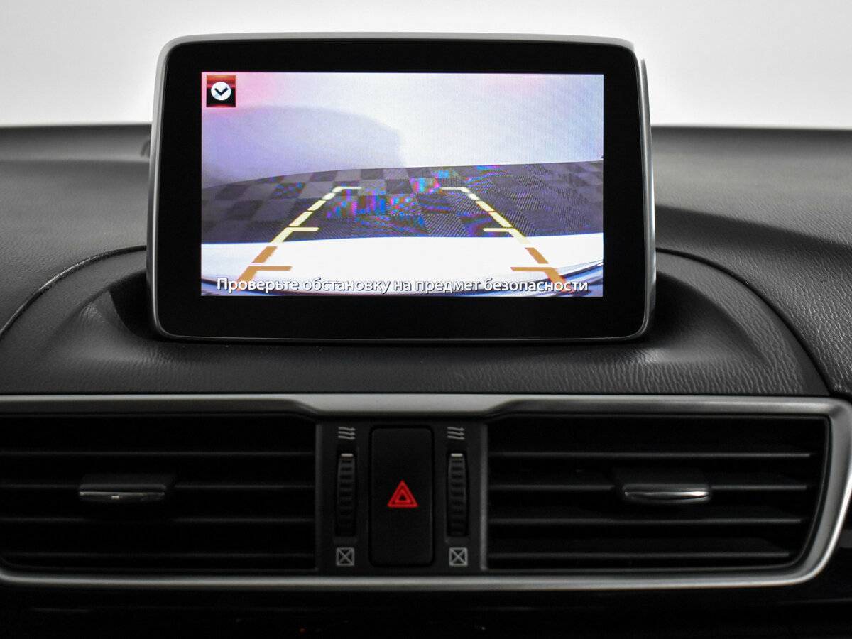 Mazda 3 с пробегом — 2014 год. Фото: #16