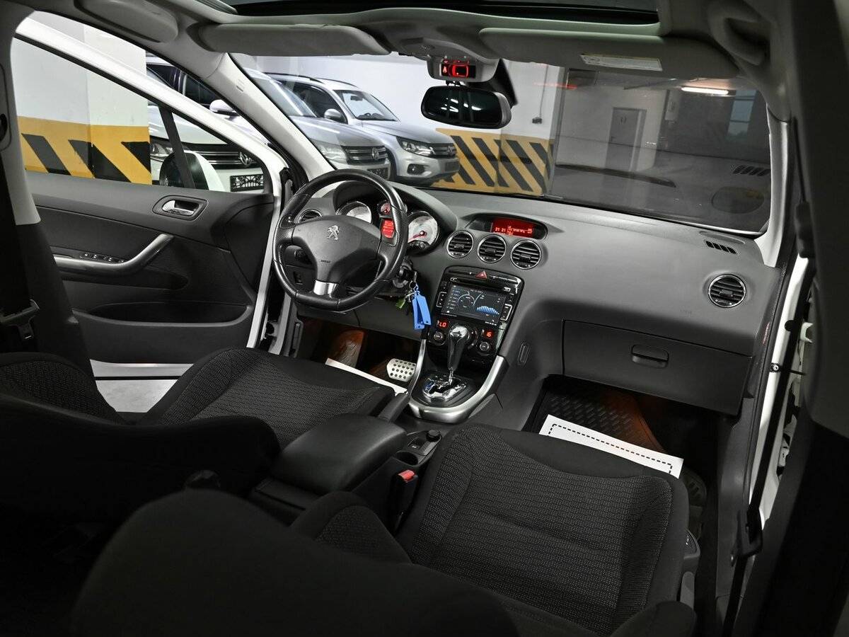 Peugeot 308 с пробегом — 2012 год. Фото: #11