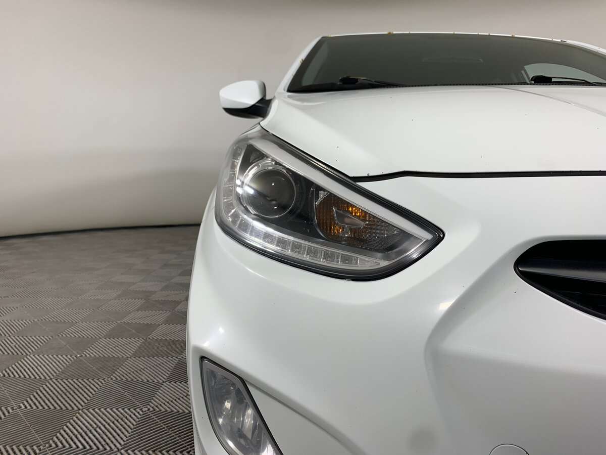 Hyundai Solaris с пробегом — 2013 год. Фото: #9