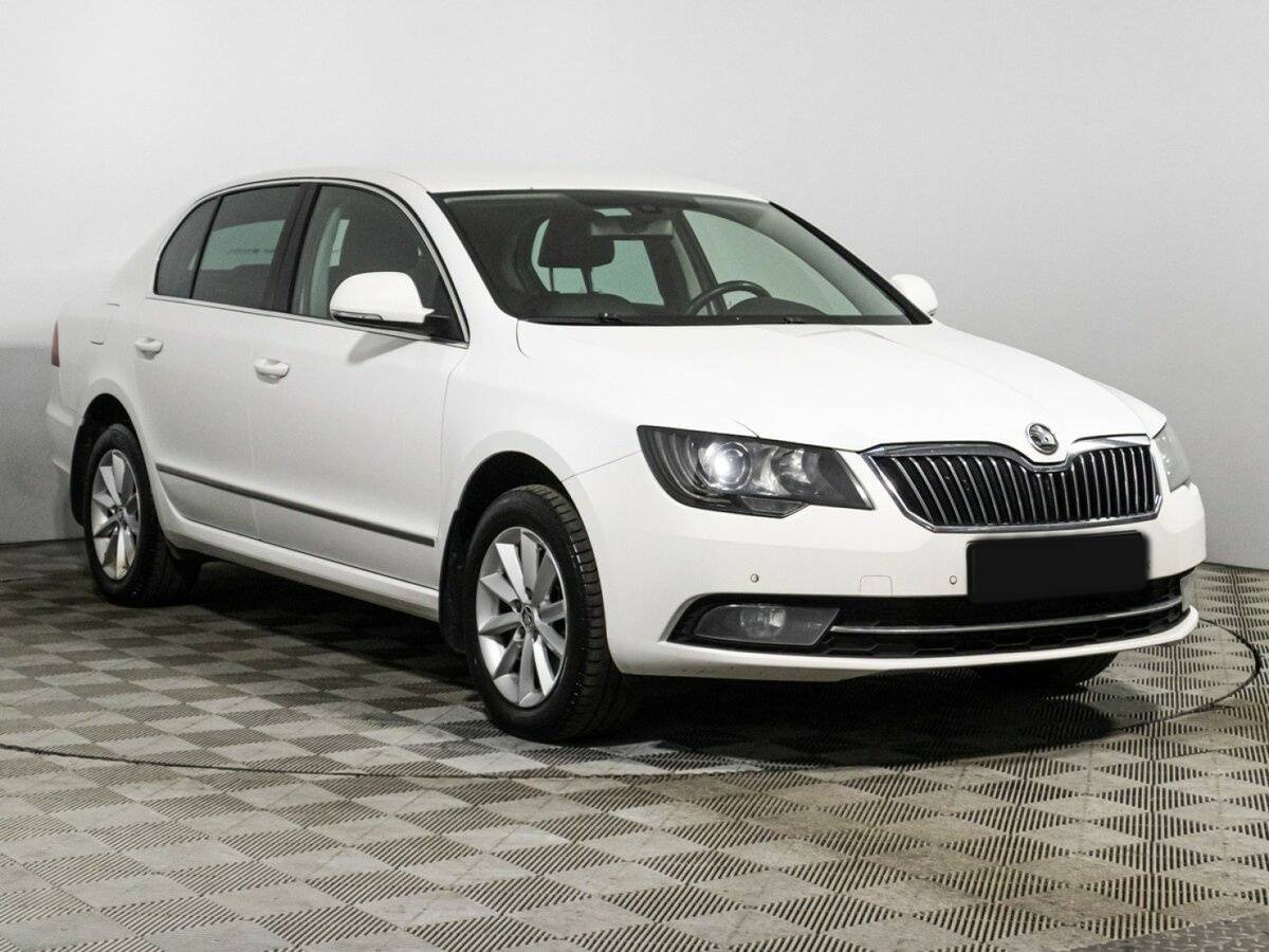 Skoda Superb с пробегом — 2013 год. Фото: #2