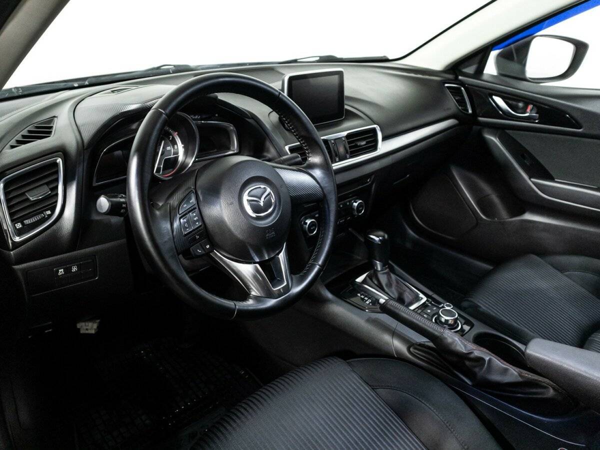 Mazda 3 с пробегом — 2013 год. Фото: #10