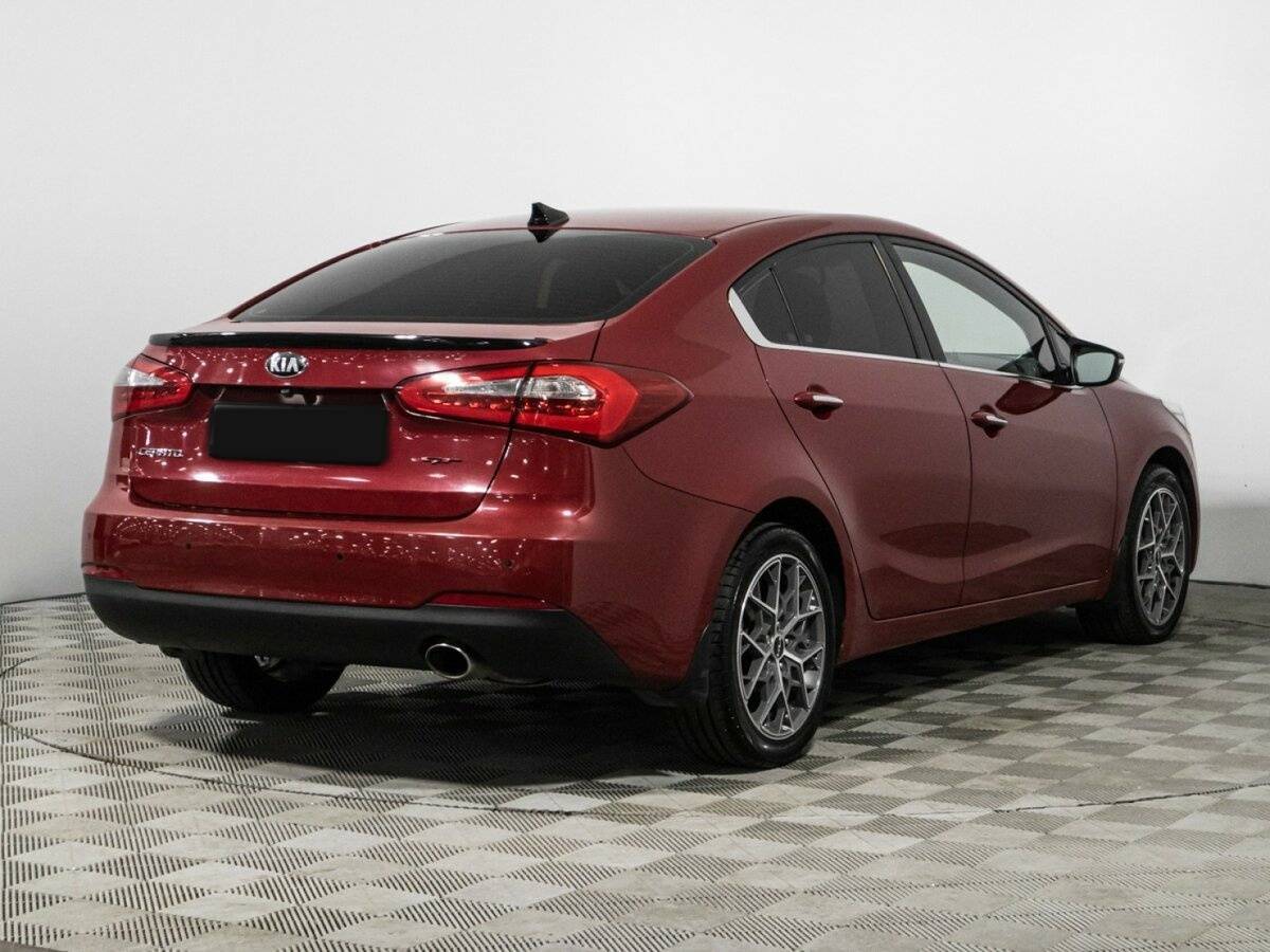Kia Cerato с пробегом — 2014 год. Фото: #4