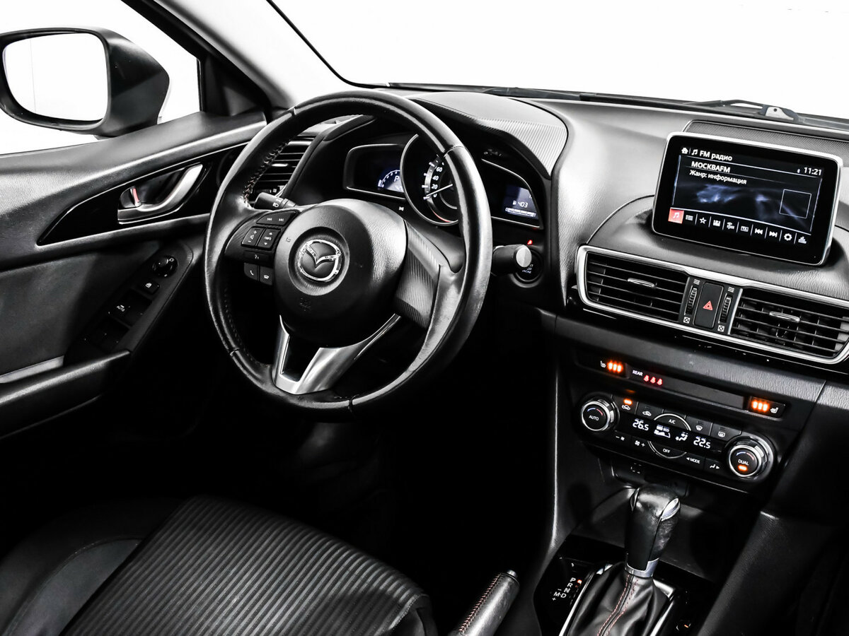 Mazda 3 с пробегом — 2015 год. Фото: #6