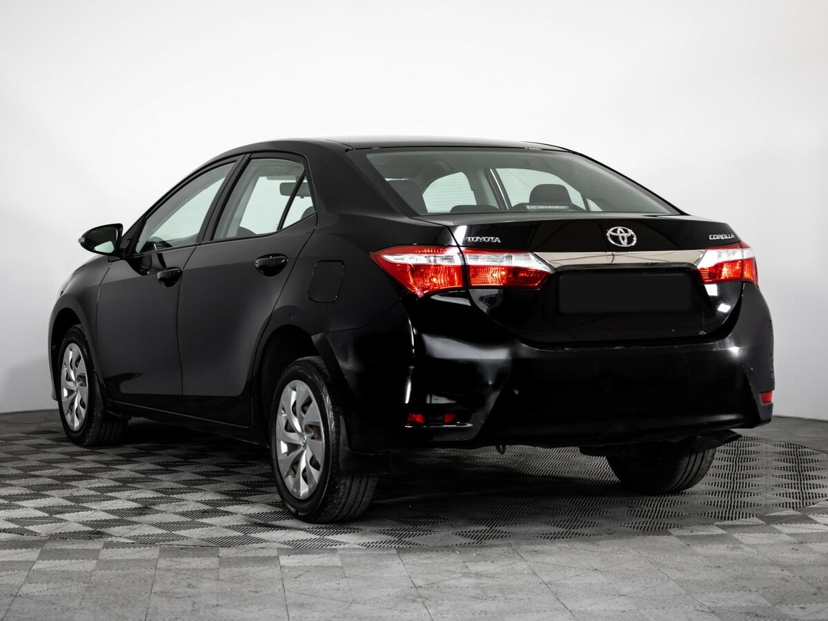 Toyota Corolla с пробегом — 2014 год. Фото: #4