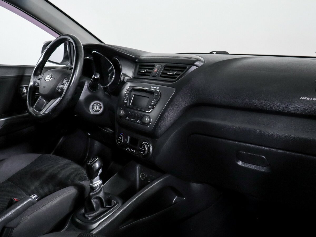 Kia Rio с пробегом — 2013 год. Фото: #6