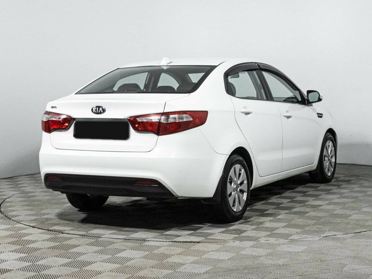 Kia Rio с пробегом — 2013 год. Фото: #4