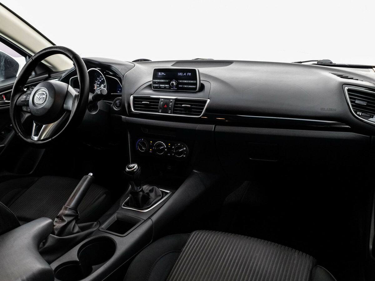 Mazda 3 с пробегом — 2013 год. Фото: #6