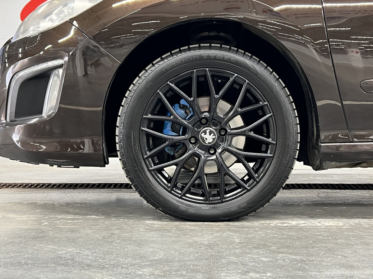 Peugeot 308 с пробегом — 2012 год. Фото: #16