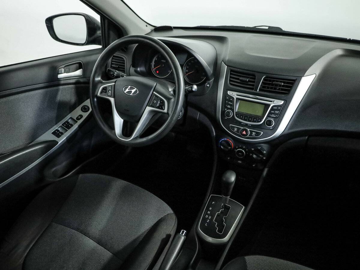 Hyundai Solaris с пробегом — 2013 год. Фото: #7