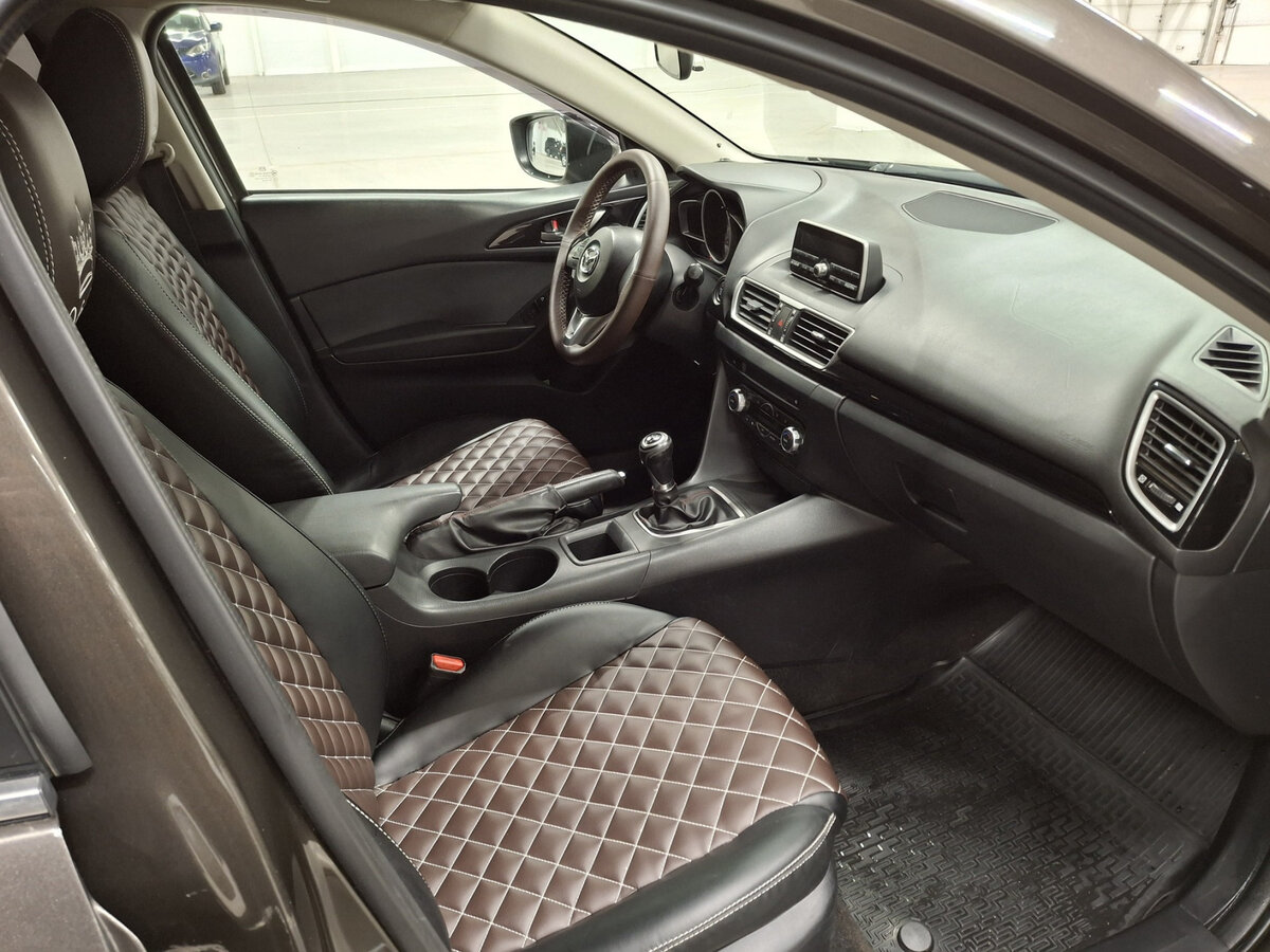 Mazda 3 с пробегом — 2014 год. Фото: #10