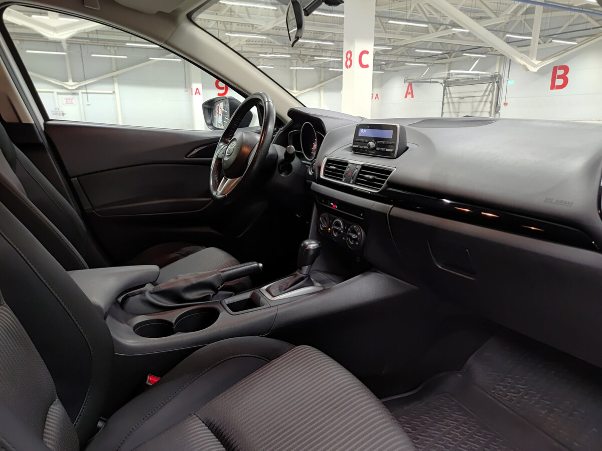 Mazda 3 с пробегом — 2014 год. Фото: #10